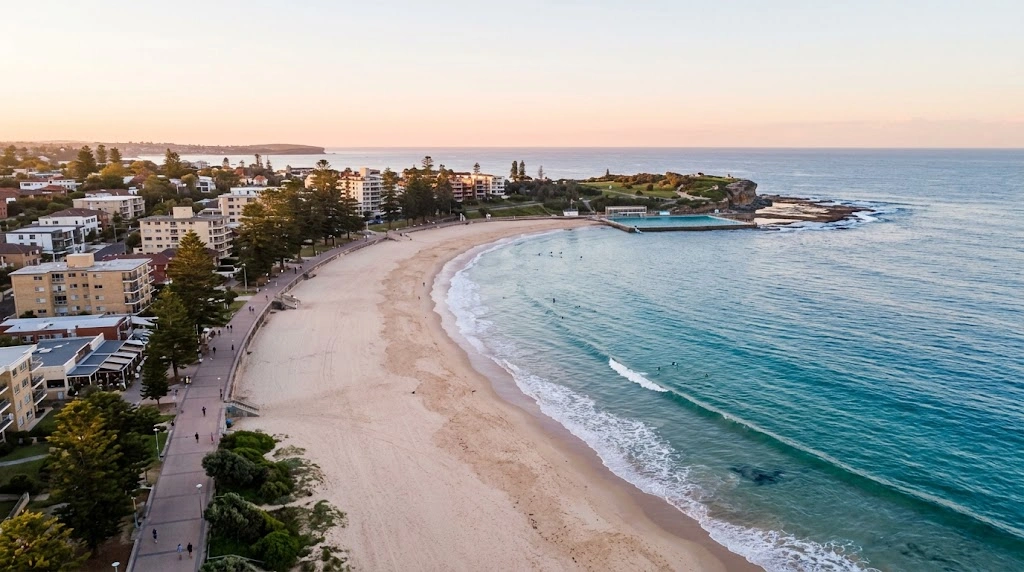 Cronulla Beach and esplanade from above at sunrise